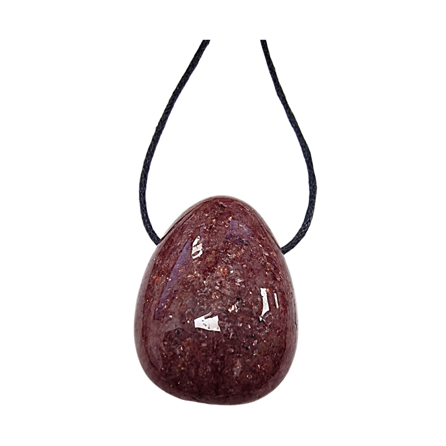 Polished Strawberry Quartz drilled tumble stone on a black vegan cotton cord, shimmering with pink inclusions and ready to wear as a heart chakra pendant.
