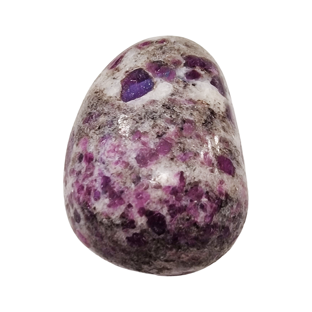 Ruby in Feldspar drilled crystal tumble, known for igniting passion, vitality, and emotional healing through the heart chakra.