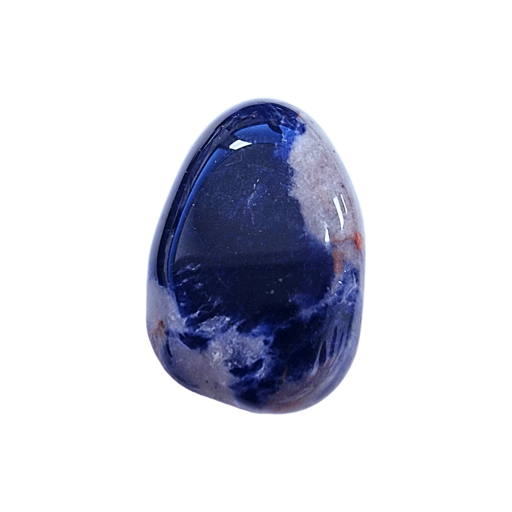 Sodalite tumble stone with rich navy tones and natural white marbling, drilled and polished for crystal jewellery or grid work.