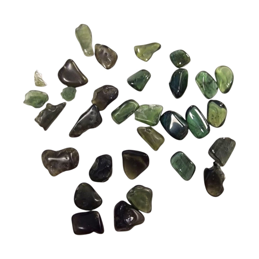 GeoFossils Moldavite Tumble Stone, a rare hand-polished green tektite for transformation, spiritual awakening, and cosmic energy.