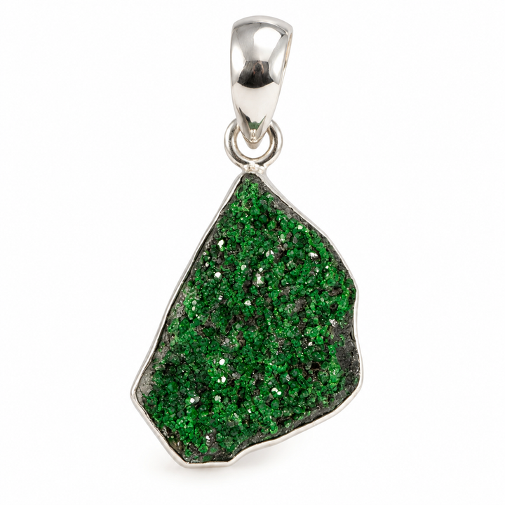 GeoFossils natural Uvarovite Garnet pendant, featuring sparkling emerald-green druzy crystals across dark mineral matrix, framed in silver with a 925 sterling silver bail.