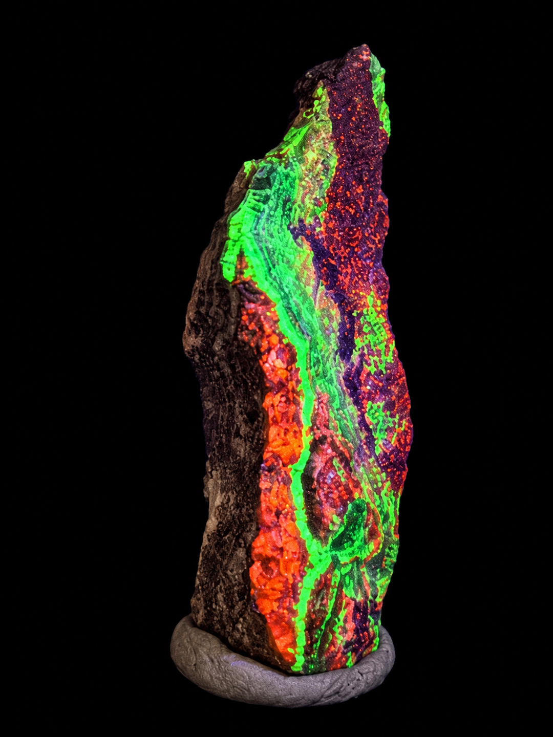 GeoFossils Willemite with Mangano Calcite Specimen 157 displaying orange and green fluorescence under UV light