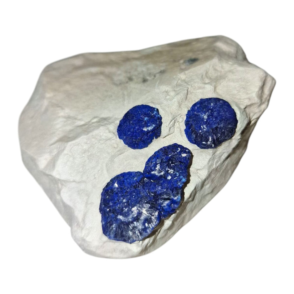 GeoFossils Azurite Sun – a rare, circular deep blue crystal formation from the Malbunka Copper Mine, Australia, with radiant patterns resembling the sun. Associated with the Third Eye and Throat Chakras, intuition, spiritual insight, and communication.