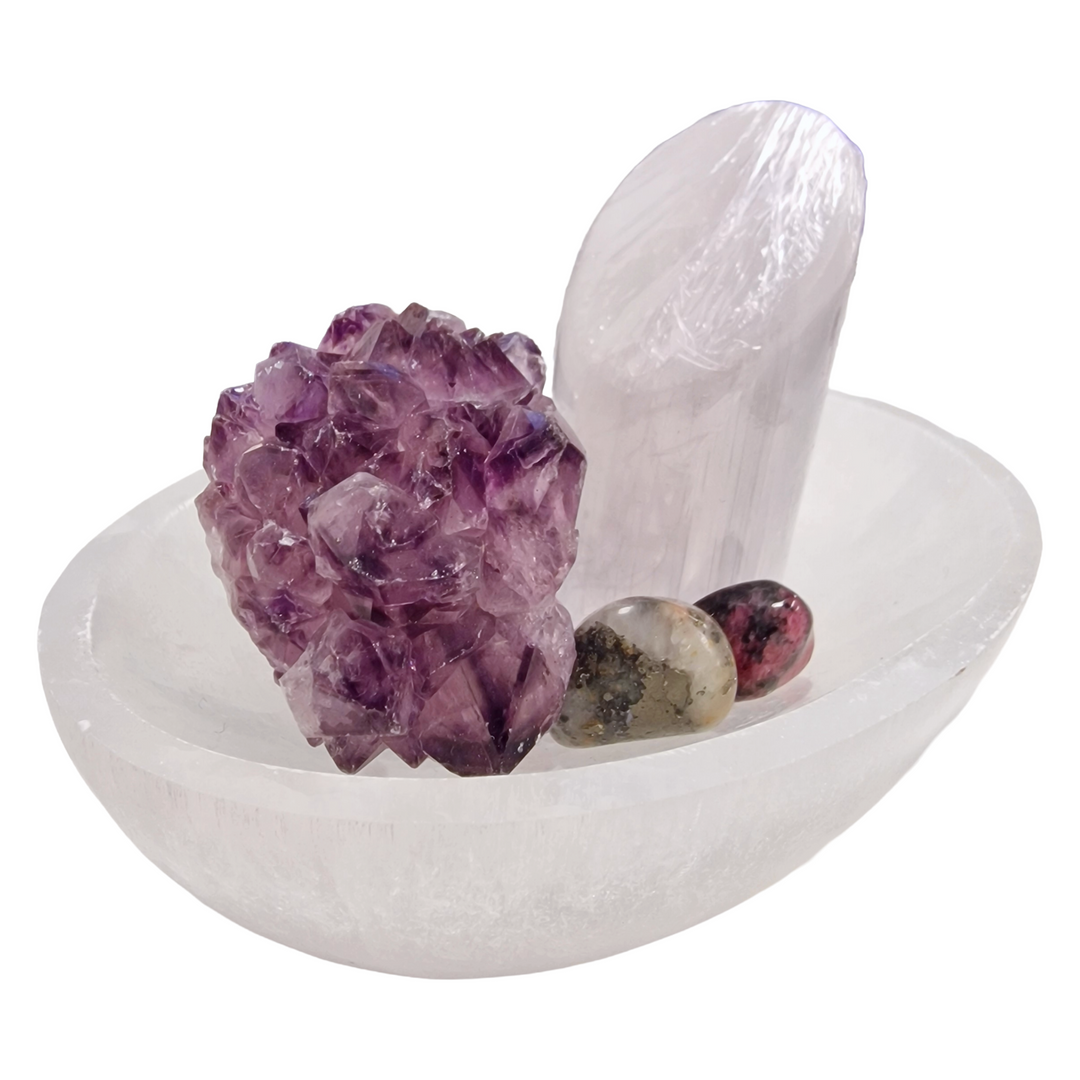 Selenite Oval Charging Bowl 10 cm shown on white background.