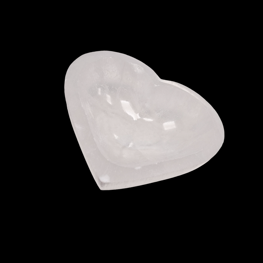 Selenite Charging Bowl 8 cm heart shape shown on black background.