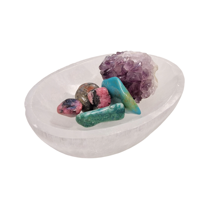Selenite Oval Charging Bowl 10 cm shown on white background with crystals not included.