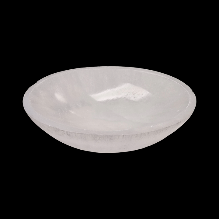 Selenite Oval Charging Bowl 10 cm shown on black background.