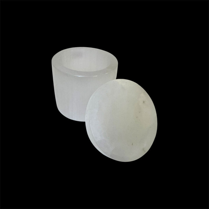 GeoFossils polished Selenite Round Charging Box with Lid, crafted from Moroccan Selenite for storing and energetically charging crystals and jewellery.