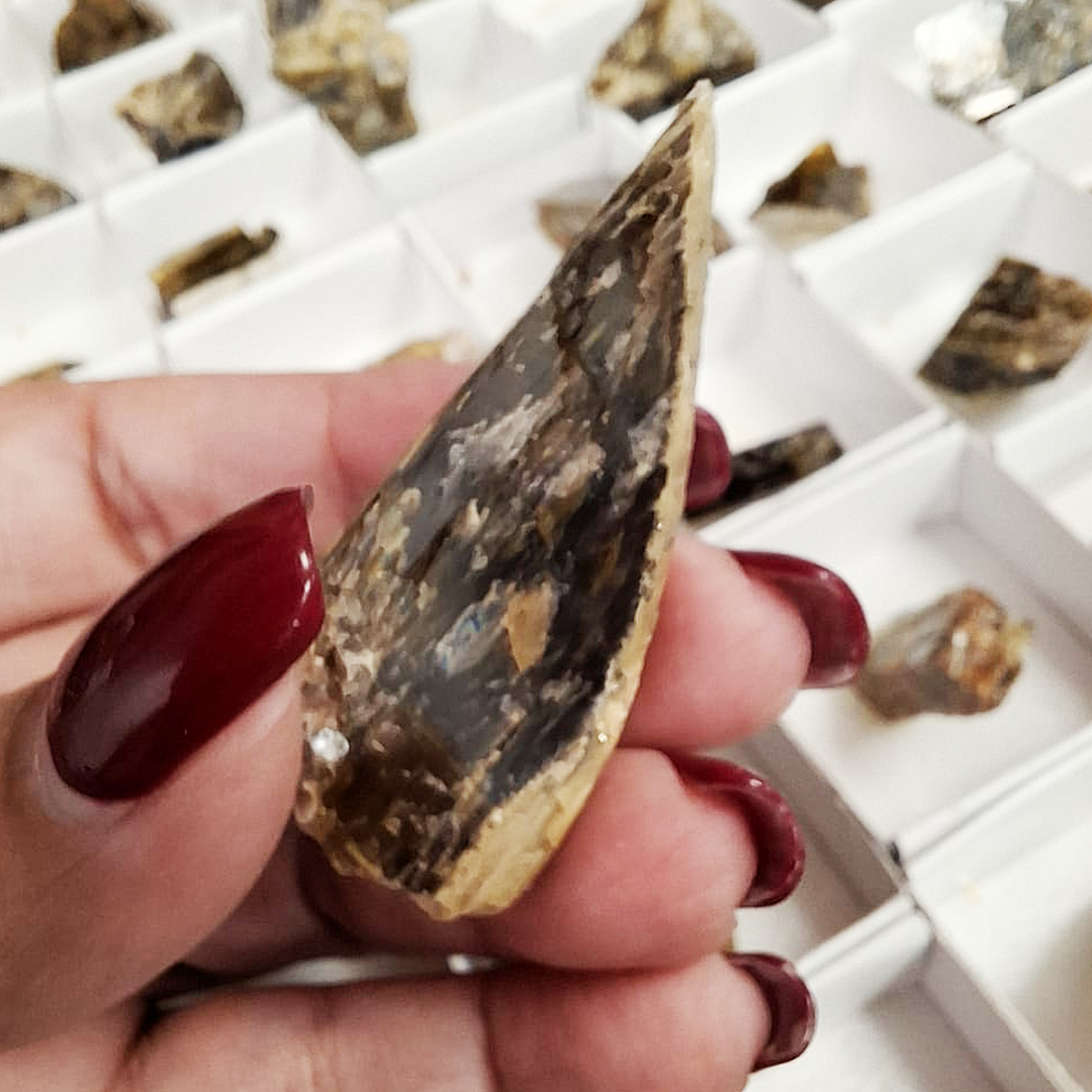 Close-up of siderite crystal from Panasqueira displaying sharp rhombohedral structure and lustre.