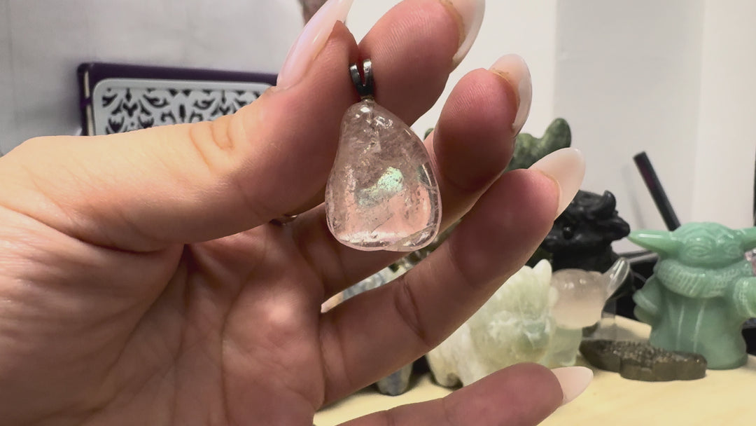 GeoFossils Morganite Tumblestone Pendant featuring a polished, translucent blush-pink gemstone with natural inclusions and a sterling silver bail, shown from multiple angles to highlight its shape, clarity and natural characteristics.