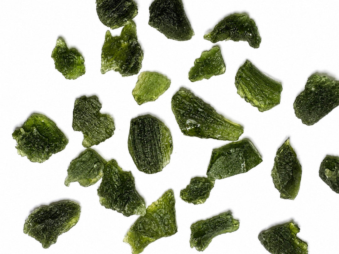Rotating video of the exact Raw Moldavite specimen showing its natural colour, sculptured surface textures and overall form from multiple angles.
