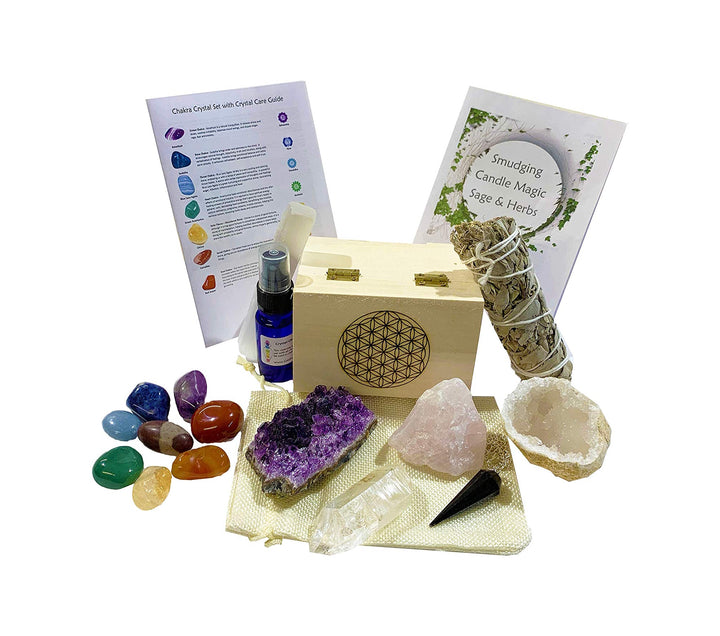 GeoFossils Bella's Eighteen pieces  Chakra Crystal Healing Kit  which includes  Chakra tumbles, Amethyst Cluster, Raw Stones, Sage, Crystal Cleansing Spray, Five Information which include Sage Smudging guide, Crystal Cleansing Guide, Chakra Balancing, How to use your pendulum, Metaphysical Information, Bohemian Gift Set