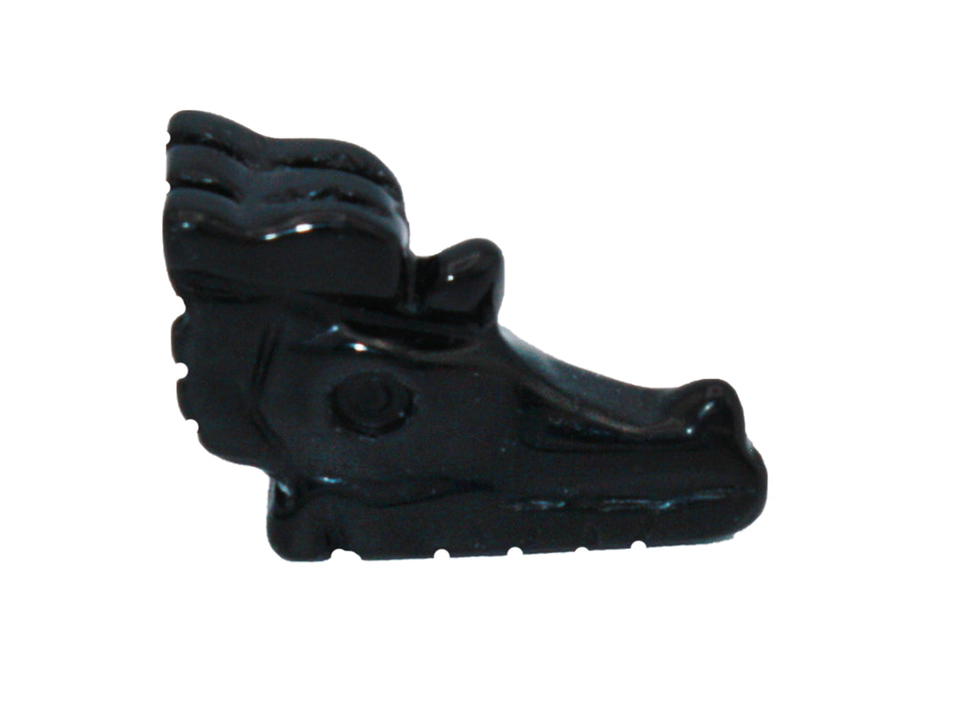 Black with small speckles of white, shiny and polished