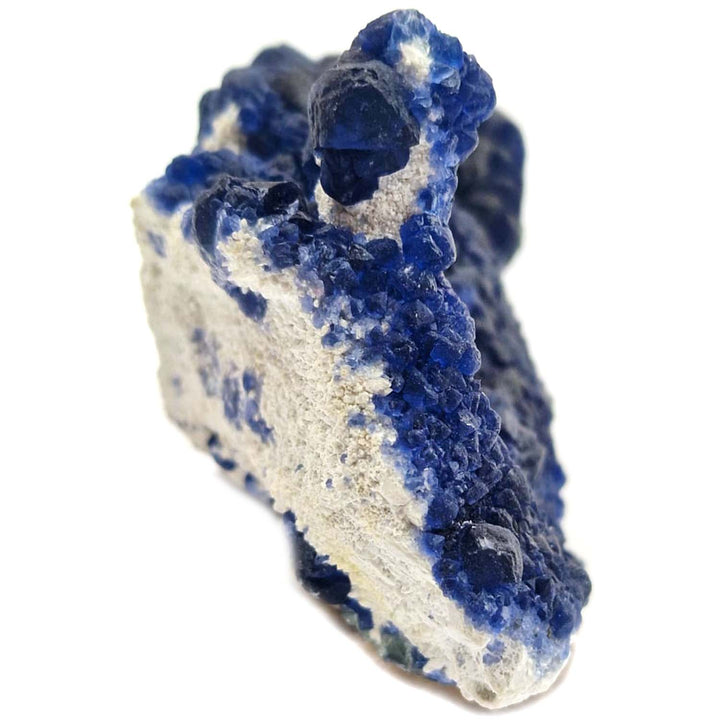 GeoFossils Blue Dodecahedral Fluorite #2 on quartz Cores.  Location | Shaft 4 Huanggang Mines, Hexigten Banner, Inner Mongolia, China
