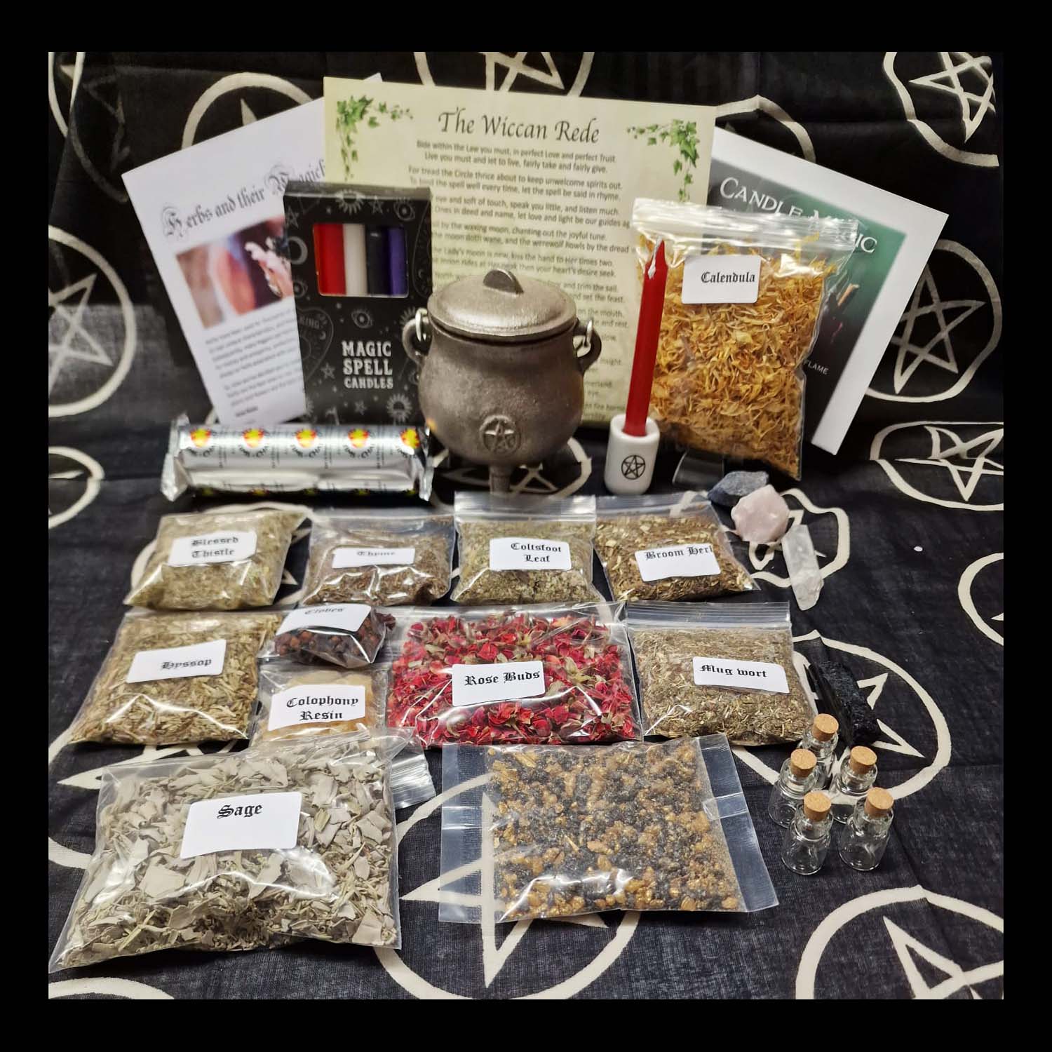 A complete Box of Shadows witchy set, featuring a Cast Iron Cauldron, spell candles, crystals, altar cloth, herbs, incense, pendulum, spell bottles, and charcoal roll. Perfect for beginners to advanced witches seeking to enhance their spellwork and rituals.