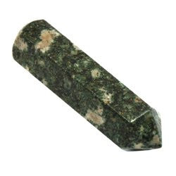 Angled view of Preseli Bluestone massage wand showing curved tip and polished surface for use in reflexology and energy work