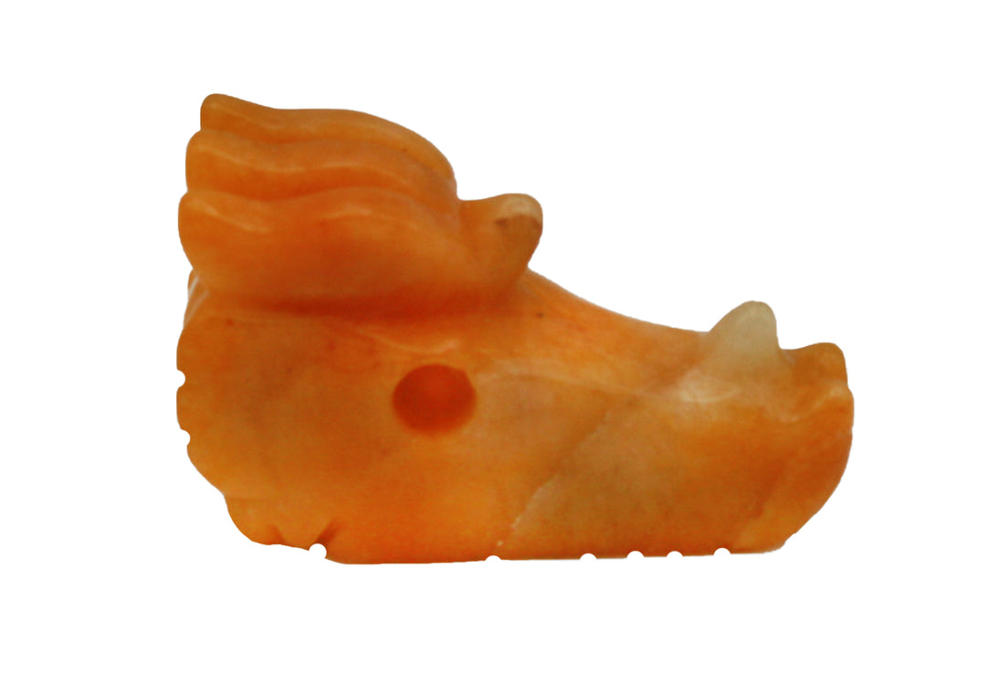 Orange with small area of white, smooth and angular