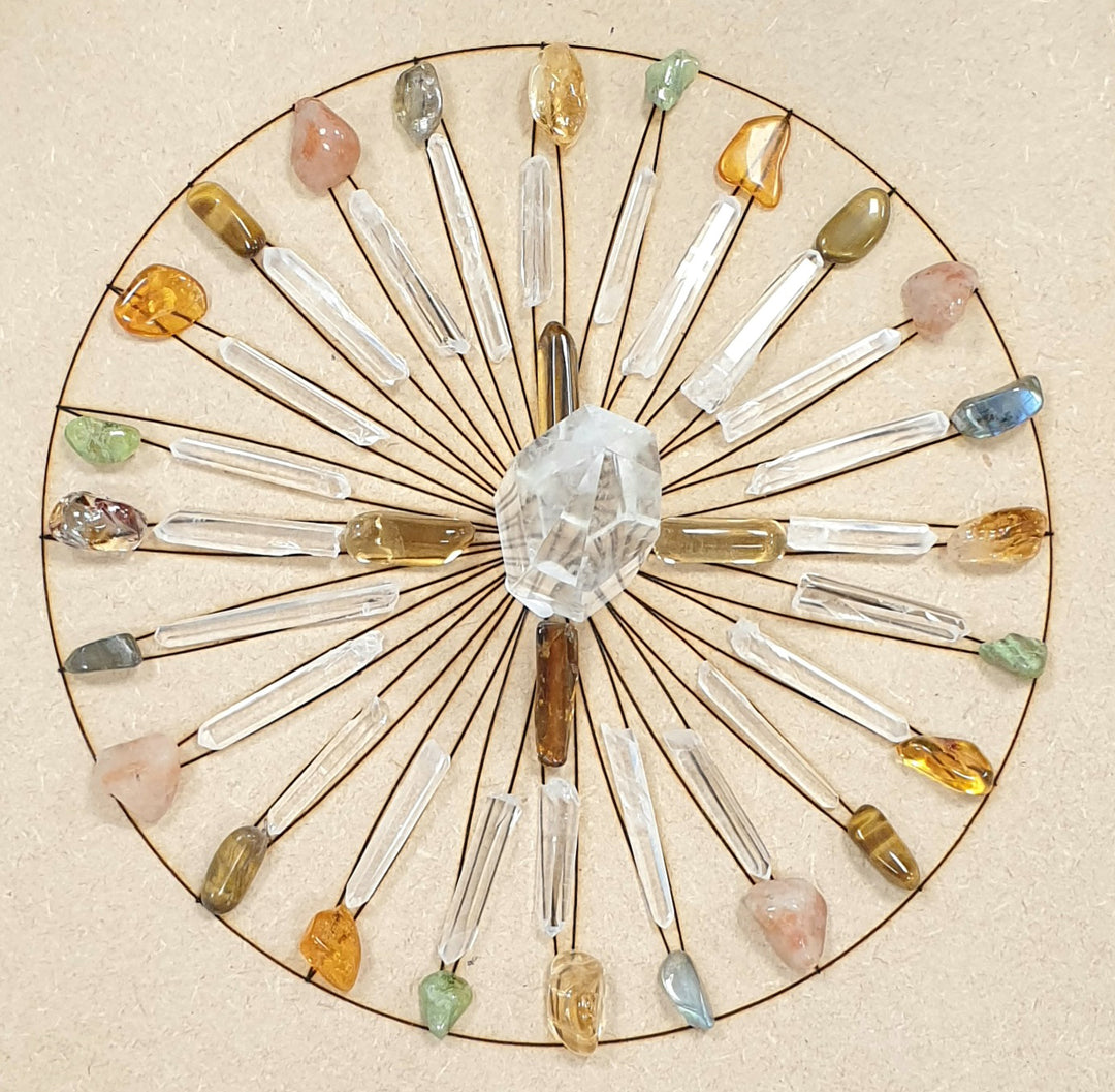 Solar Manifesting Grid with Clear Quartz centre, Citrine fingers, Blades of Light Quartz, and outer circle of Peridot, Tigers Eye, Aventurine, and Sunstone.