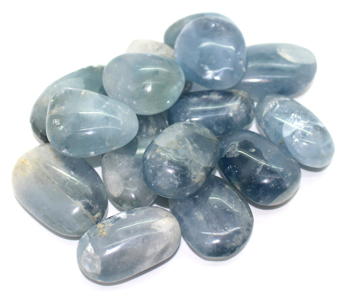 GeoFossils Celestite Palm Stone, a soft sky-blue crystal for peace, clarity, and divine connection.