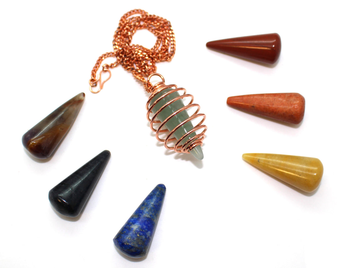 Spiral Chakra Cone Pendant Set with seven interchangeable chakra crystal cones in a copper or silver-tone spiral cage for personalised energy alignment. Copper Effect