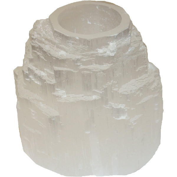 Selenite Mountain Tealight Holder in a natural, raw-inspired shape, glowing softly when lit, ideal for cleansing and calm.