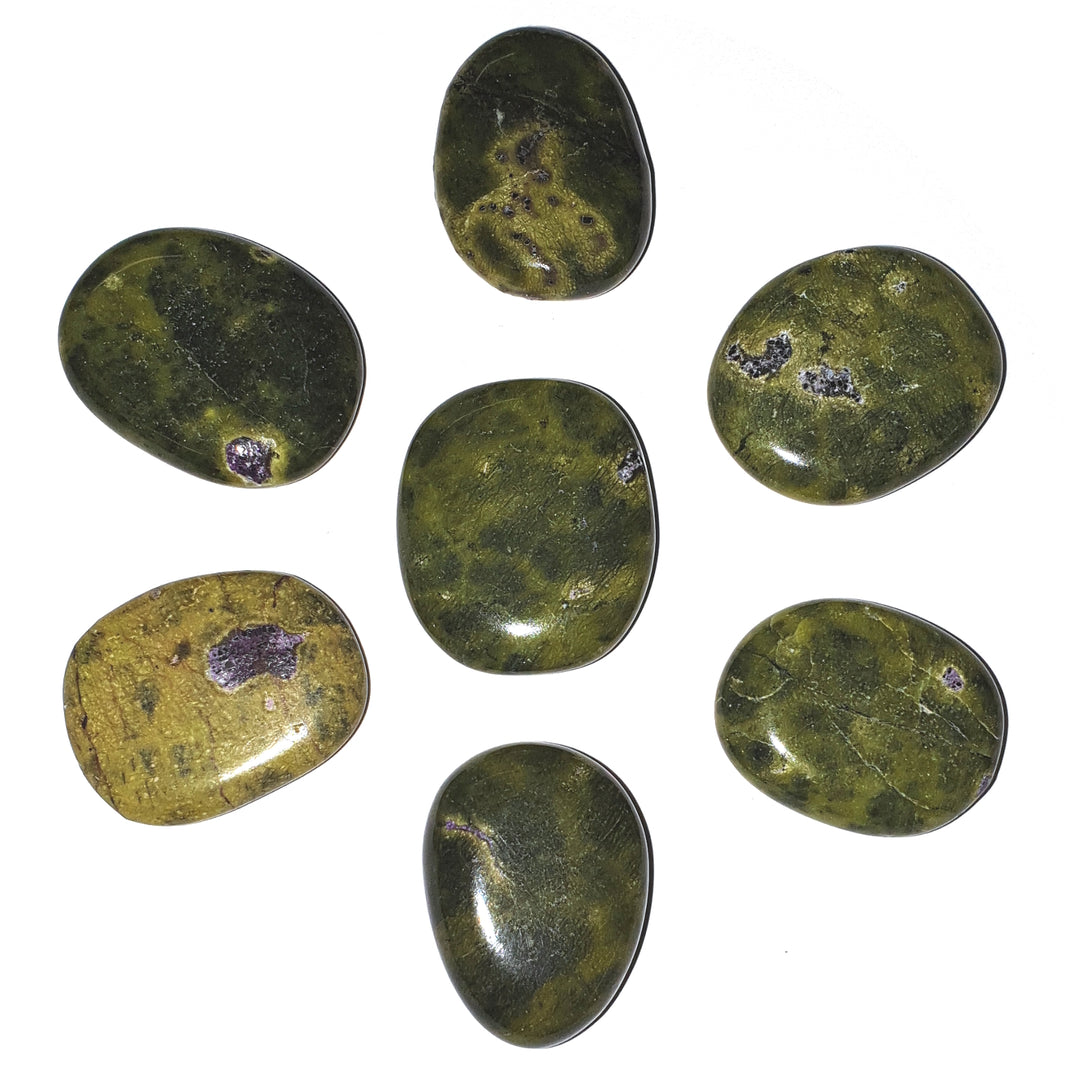 Atlantisite Mini Oval – a green and purple crystal known for promoting emotional healing, protection, and spiritual growth. Ideal for grounding and fostering peace.